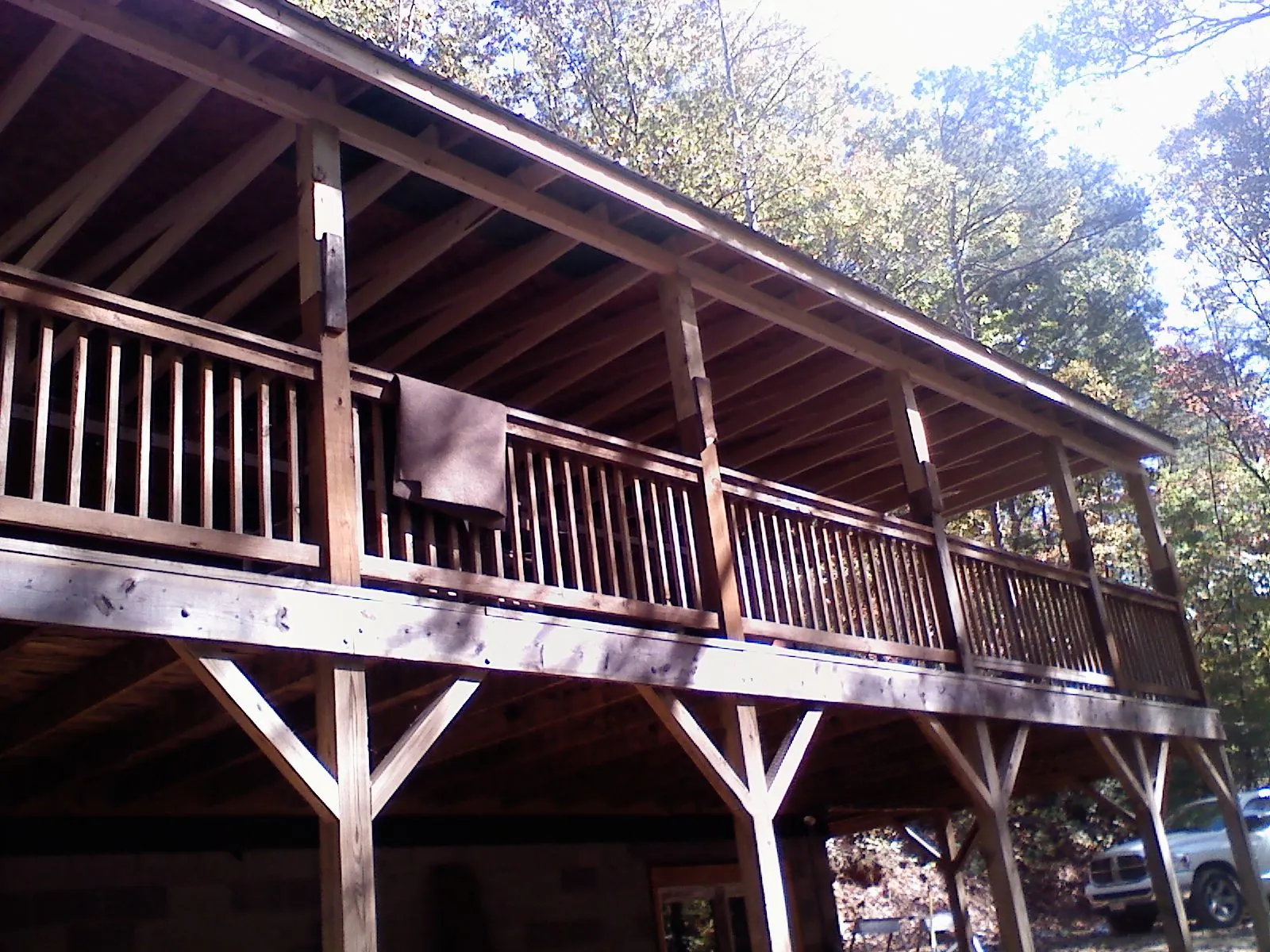 Timber framing under a new elevated porch and deck — Roof Leak Repair in Ossipee by Roofing Brothers